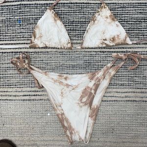 Frankie’s Tie dye bathing suit.